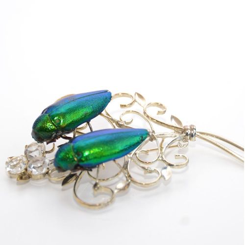 Emerald beetle brooch twin. Silver plated with stones